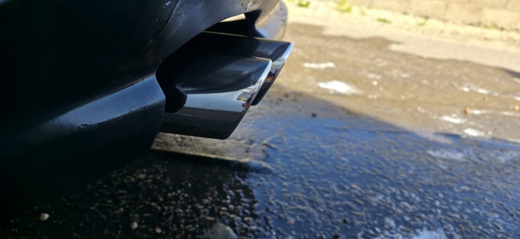 Polished chrome exhaust tip after detailing