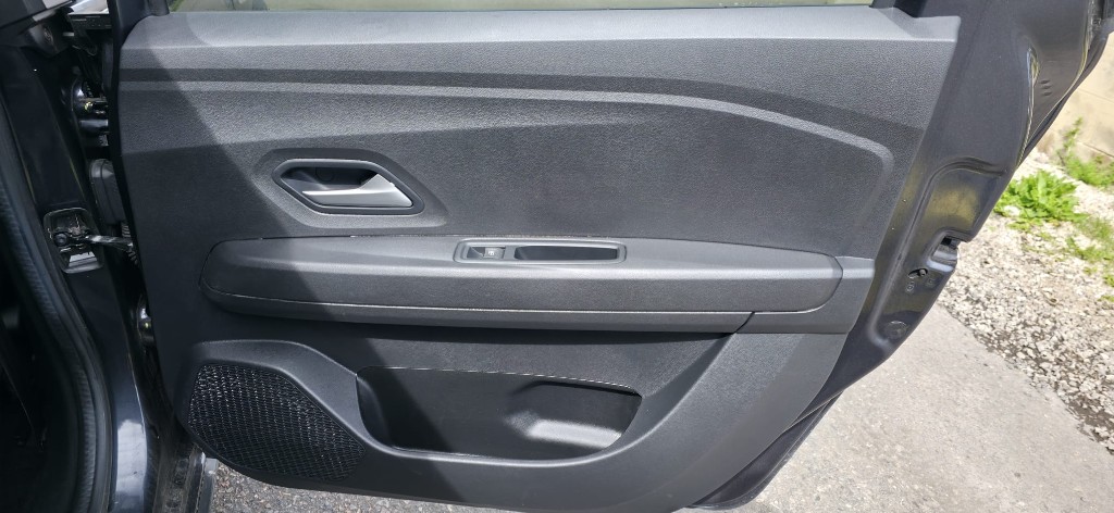 Clean, dressed rear door card after cleaning